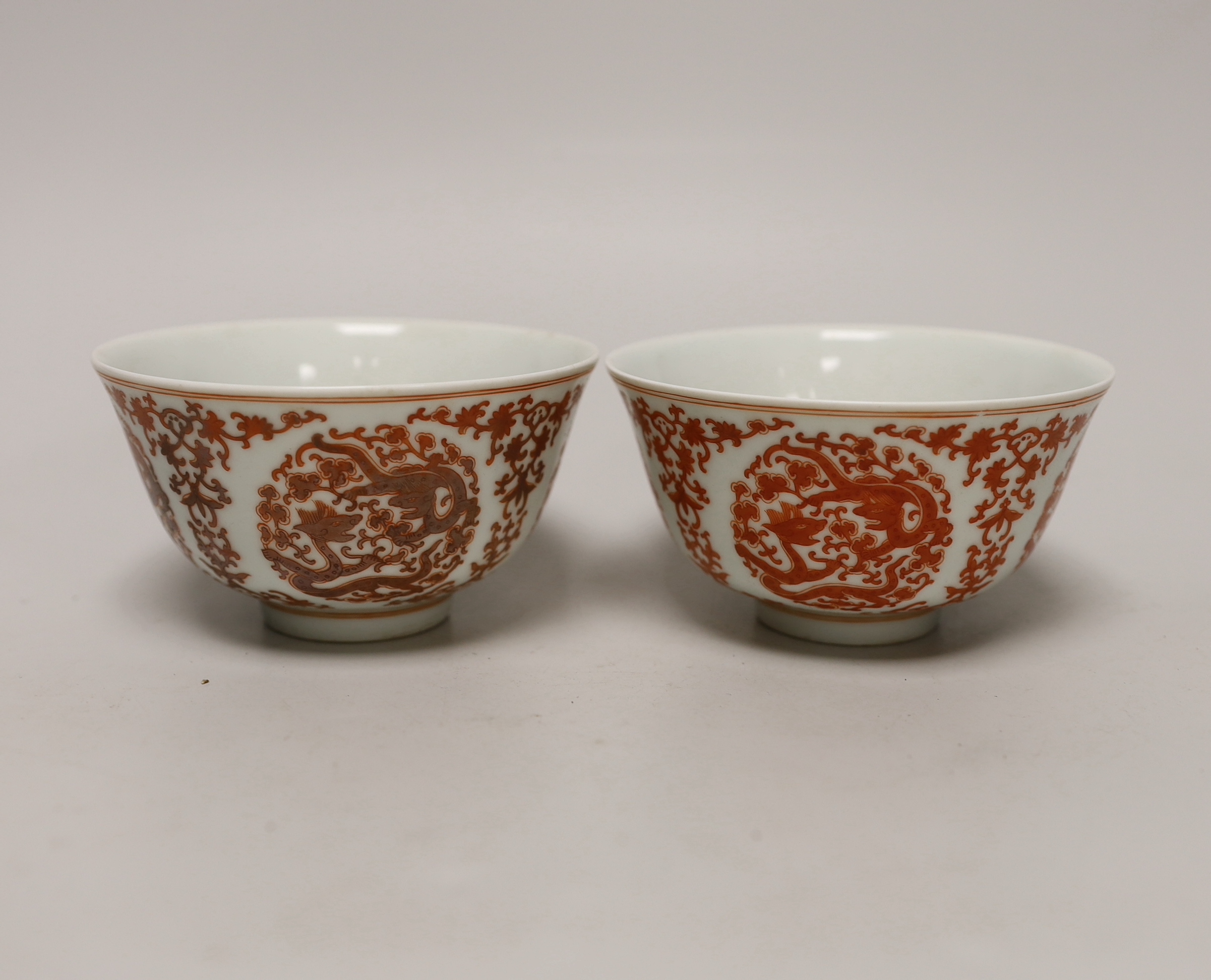 A pair of Chinese iron-red enamelled bowls, 11.5cm diameter